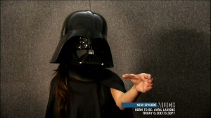Selena Gomez dressed as Darth Vader force chocking some guy
