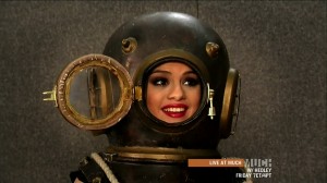 Selena Gomez wearing a deep sea diving helmet