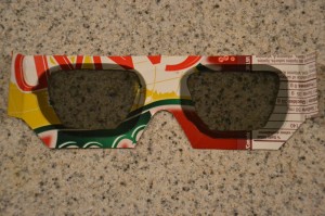Make your own 2D to 3D glasses - Tape the lenses to the cardboard frames