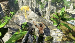 PlayStation Vita - Uncharted: Golden Abyss - Nathan Drake scaling a wall