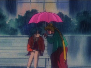 Sailor Moon episode 149  - Usagi offers Fish Eye an umbrella