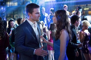 Stephen Amell as Oliver Queen and Willa Holland as Thea Queen in Arrow